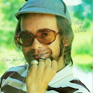  The Disheveled Image Of Elton On The Cover Of "Rock Of The Westies" Couldn't Stand Farther Removed From The Illustration Used For The Previous Disc, "Captain Fantastic And The Brown Dirt Cowboy".